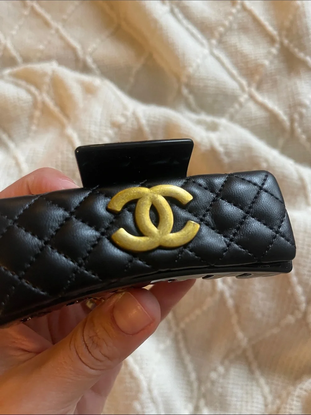 CHANEL Black Quilted Leather Hair Clip with Gold CC Emblem